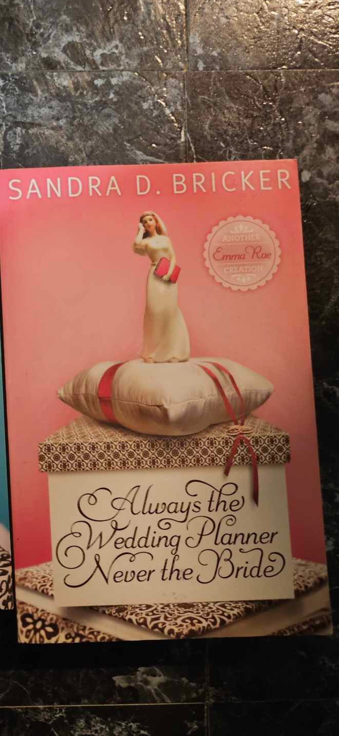 Always the Wedding Planner, Never the Bride
Novel By: Sandra Bricker